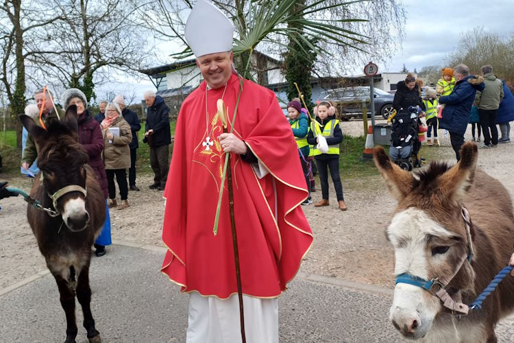 Bishop and donkeys led procession to Barton Turf 